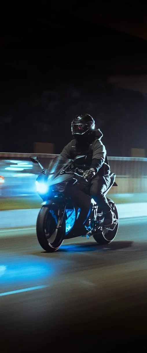 Night ride on sportbike with custom blue underglow lighting